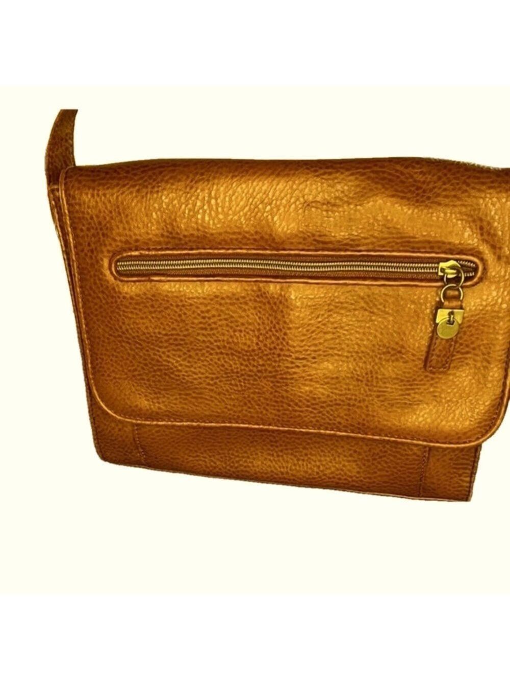 Relic Brown Crossbody, excellent condition, 11”x9”x3”, flap close, 3 zip pock T5